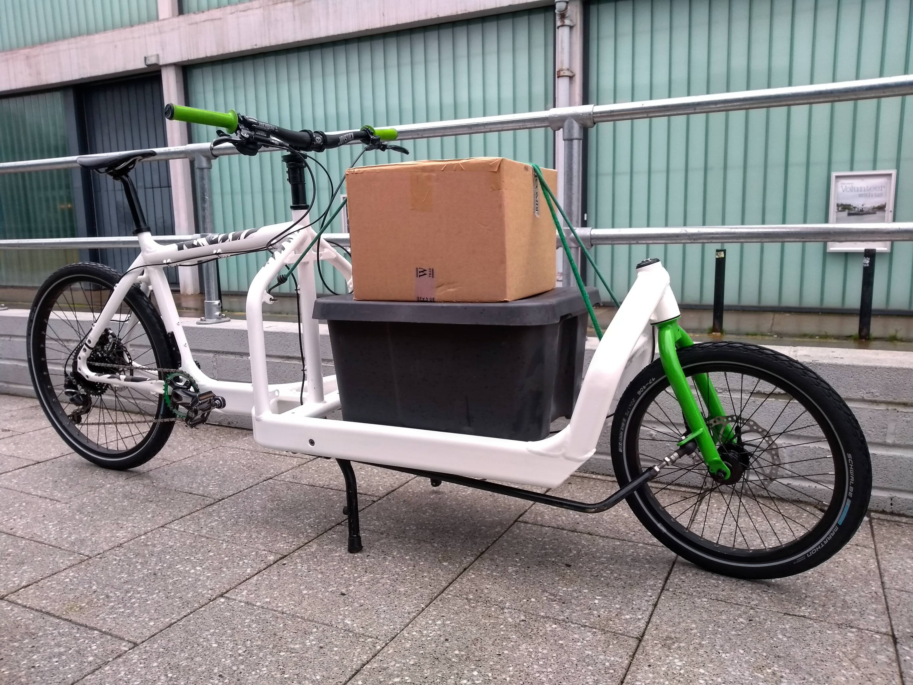 A Velocious courier cycling through Bristol